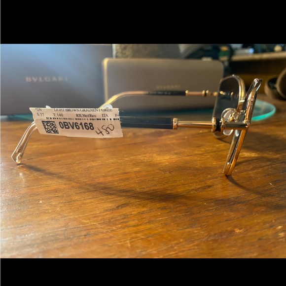 Gold cateye bvlgari sunglasses w/ black&gold details. Lens: light brown gradient - Picture 2 of 2